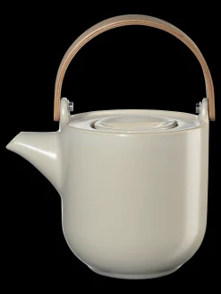 teekanne mit hellem holzgriff, tofu